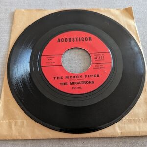 The Megatrons Velvet Waters/The Merry Piper 45 Vinyl Record